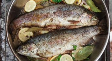 pot with two fish ready to be cooked