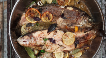 pot with two cooked fish